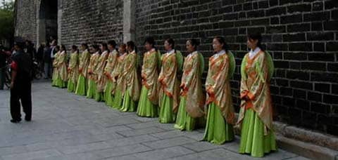 Dancers outside Confucian temple, Qufu, China: Public Domain