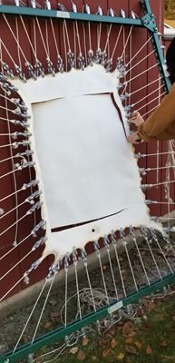 cutting parchment from frame