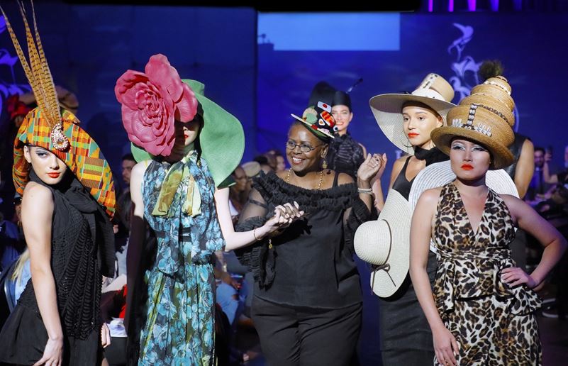 Petty with her designs 