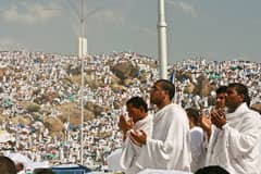 Praying at Mt Arafat during the annual pilgrimage (hajj). Source: Aljazeera