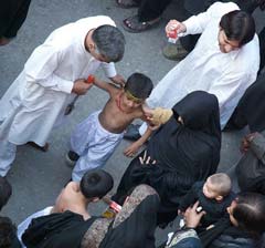 Children reenact the martyrdom of imam Husayn. Source: zahrasyed @ Flickr