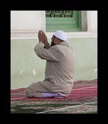 Muslim at prayer inside a mosque: photo courtesy of dperstin via C.C. License at Flickr