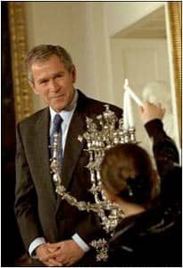 President George W. Bush at a hanukkiyah lighting in the White House in 2001