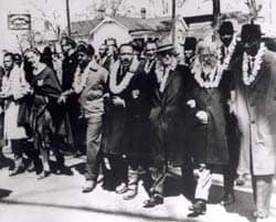 title: Rabbi Abraham Joshua Heschel (2nd from right) in the Selma Civil Rights March with Martin Luther King, Jr. (4th from right). Source: http://en.wikipedia.org/wiki/File:SelmaHeschelMarch.jpg